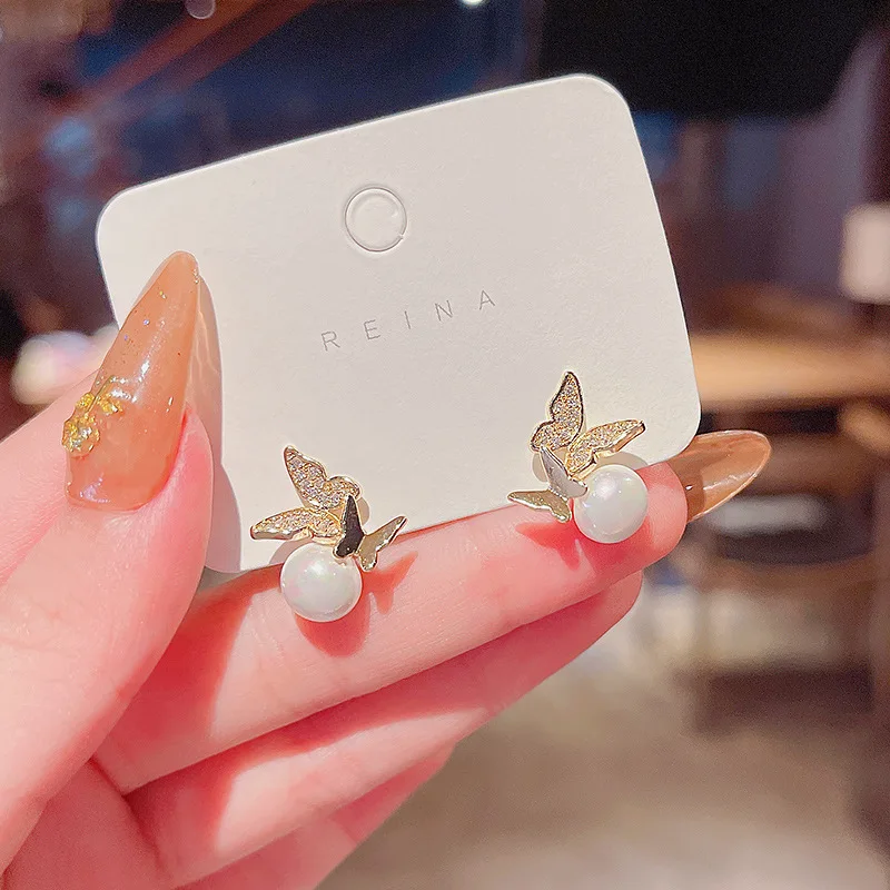 S925 jewelry solid silver Bowknot Pearl Temperament Stud Earrings Needle Micro Inlaid Earrings 925 sterling silver Zircon stud e