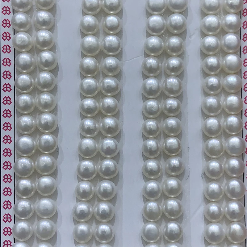 
wholesale natural AA grade freshwater flat back pearls,half round,good luster,very clean surface,full size available,hand-paired 