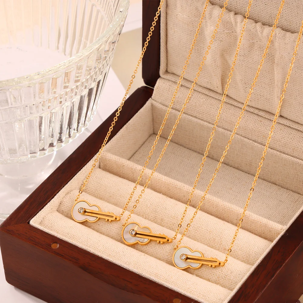Simple Stainless Steel Gold Plated  White Shell Musical Instrument Guitar Violin Shape Cubic Zirconia Pendant Necklace for Women
