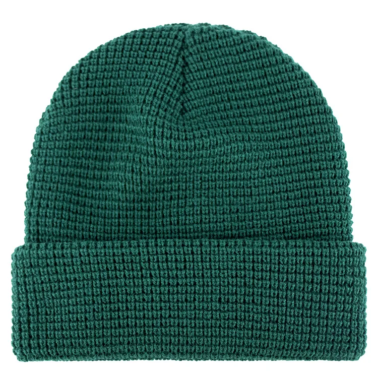 Hengxing solid green color custom pvc rubber patch skull cap soft cuffed winter warm hat waffle knit beanie manufacturer