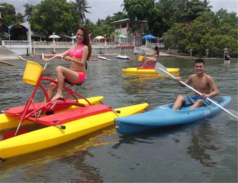 floating boat able to cycle on water mounted on two floats, recreational and competitive activity using water bike