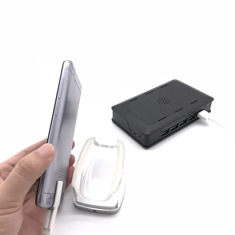 Multi ports anti-theft alarm charging remote display holder smart phone security exhibition device