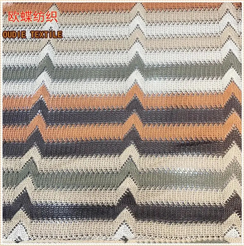 The manufacturer directly provides polyester yarn dyed blended polyester bright silk mesh knitted clothing fabric