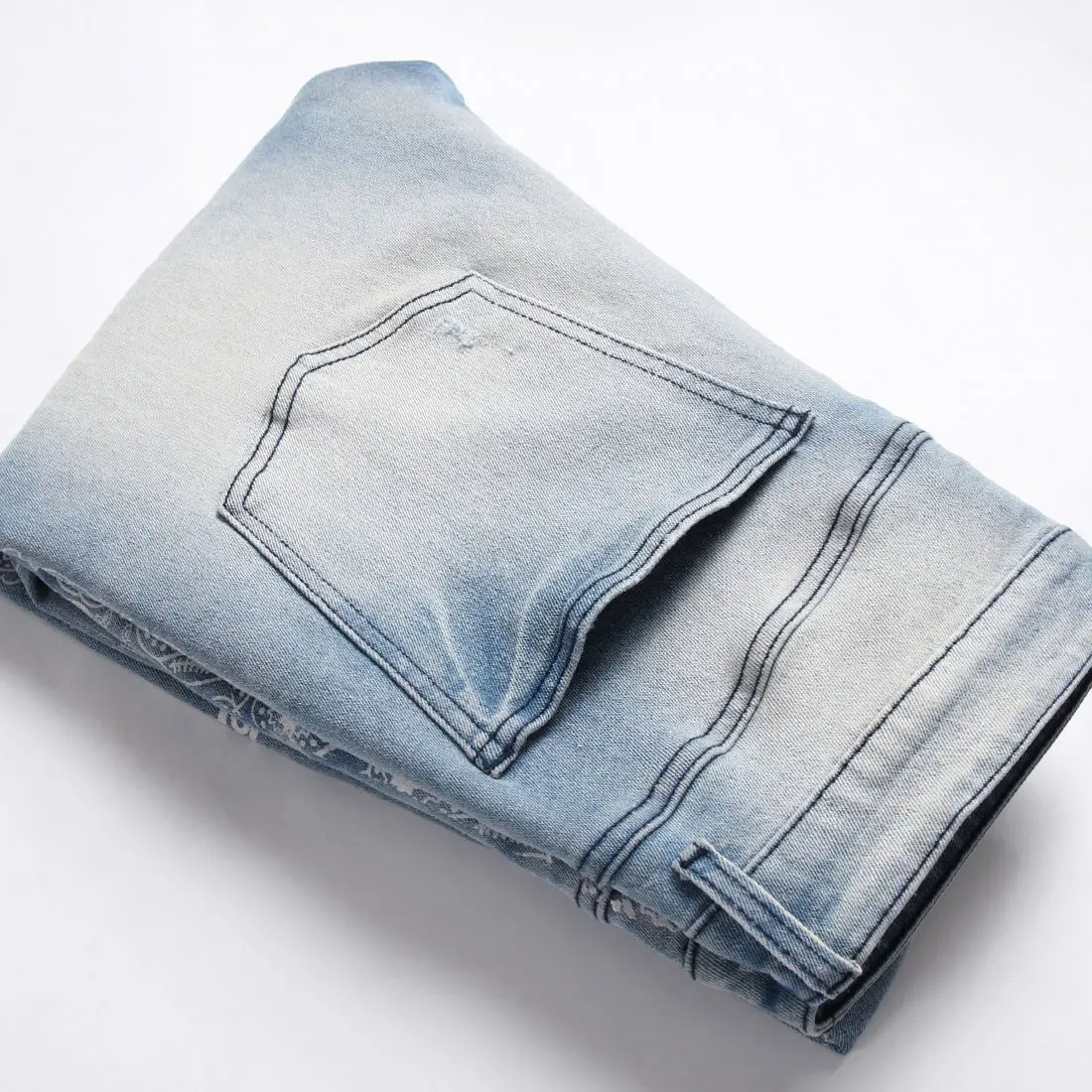 AeeDenim OEM ODM Logo AM light blue elastic slim small straight knee hole cashew flower digital printing denim jeans