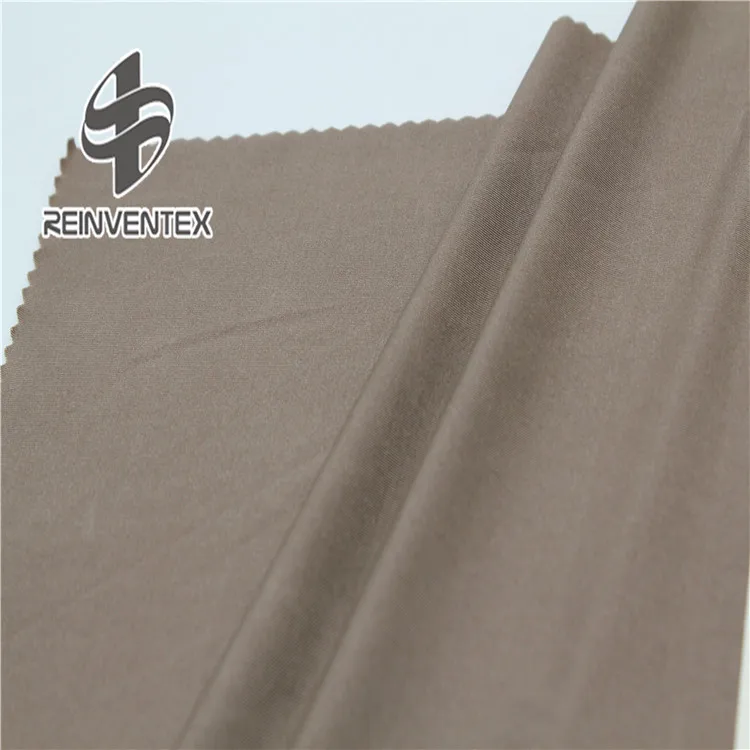
1754 Shaoxing wholesale knit smooth single jersey shiny polyester spandex stock lot fabric for tshirt vest 