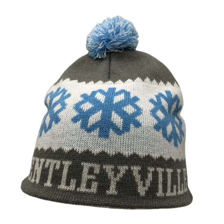 Hot Sale Acrylic Cuff Jacquard Knitted Winter Hat Beanie Hat Embroidered Pom Pom Ball Beanie Cap With Custom Leather Badge Logo
