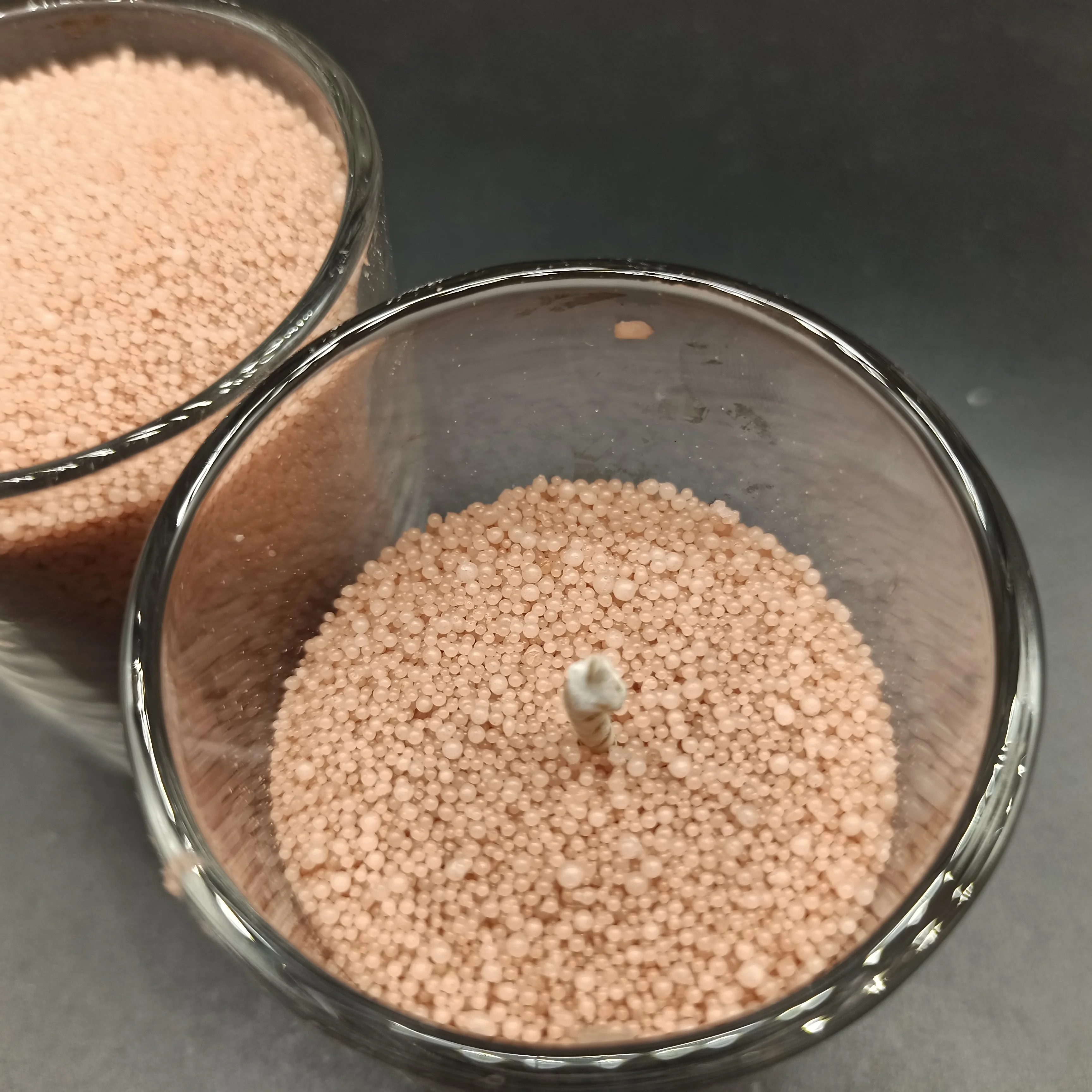 Plant based powder candle wax sand in colors orange pink desert rose
