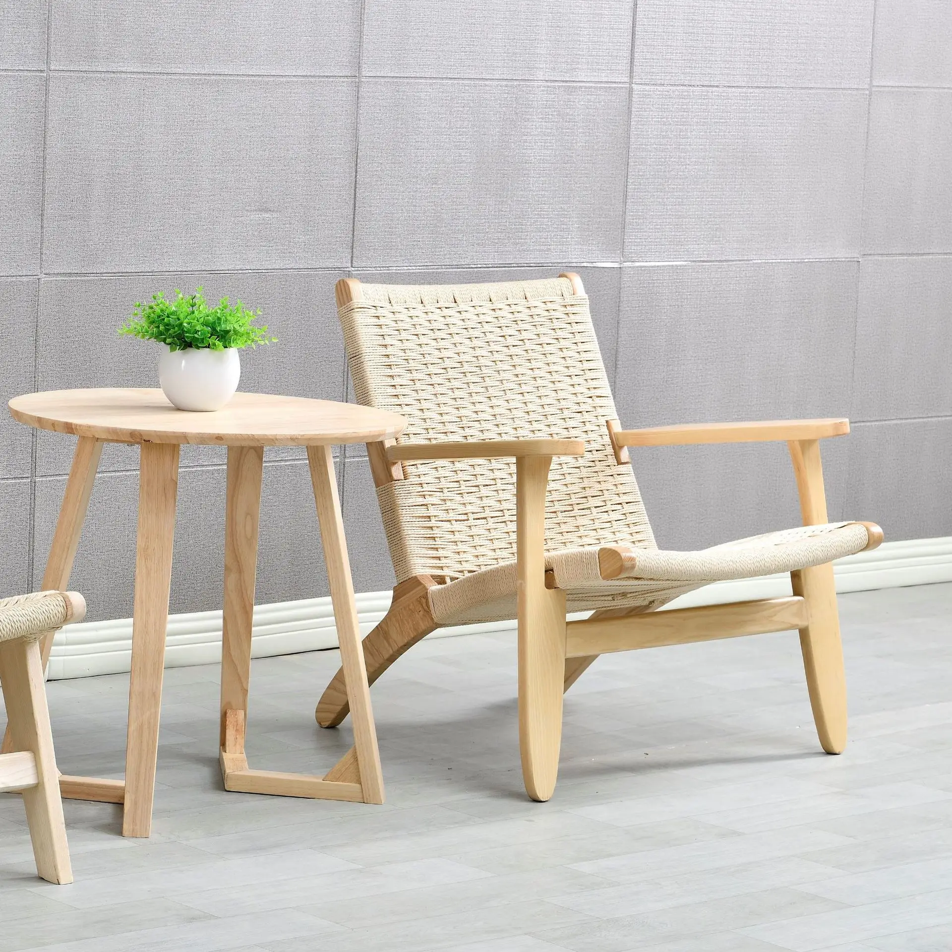 Designers all over the world pursue Nordic rattan saddle chair solid wood back lounge chair