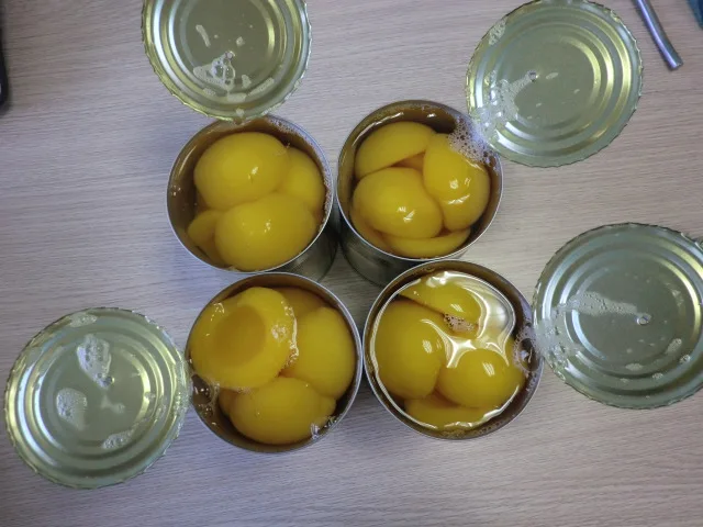 Premium Export-Grade Canned Yellow Peaches in Syrup Freshly Crafted for Baking and Beverage Preparation