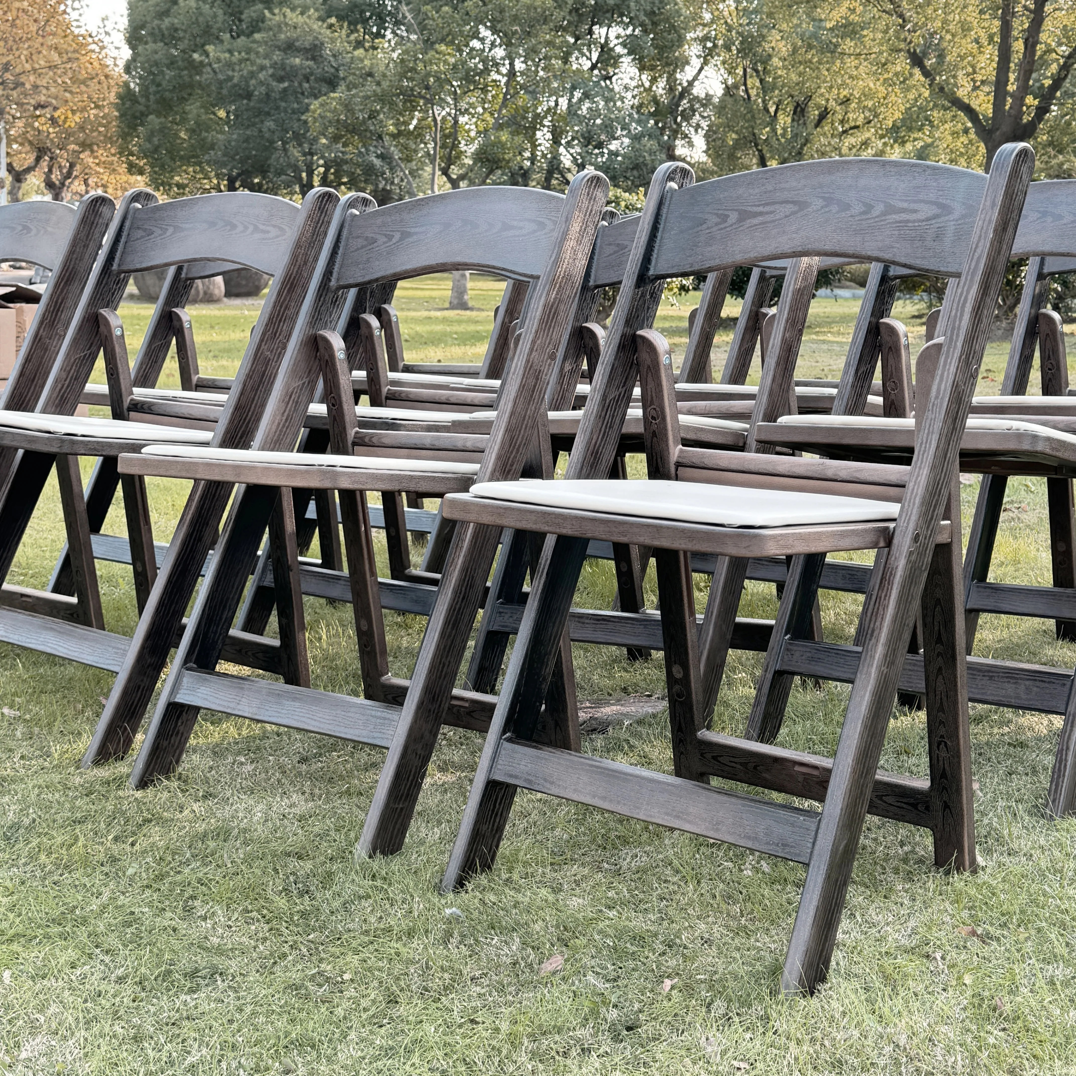 Wholesale garden walnut wood grain beach wedding event party wimbledon white wooden resin folding chair for decoration