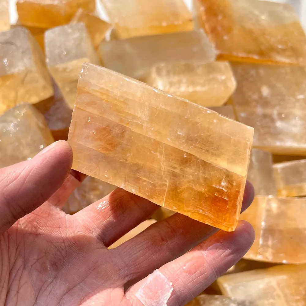Wholesale natural crystal calcite yellow stone high quality raw yellow calcite stone