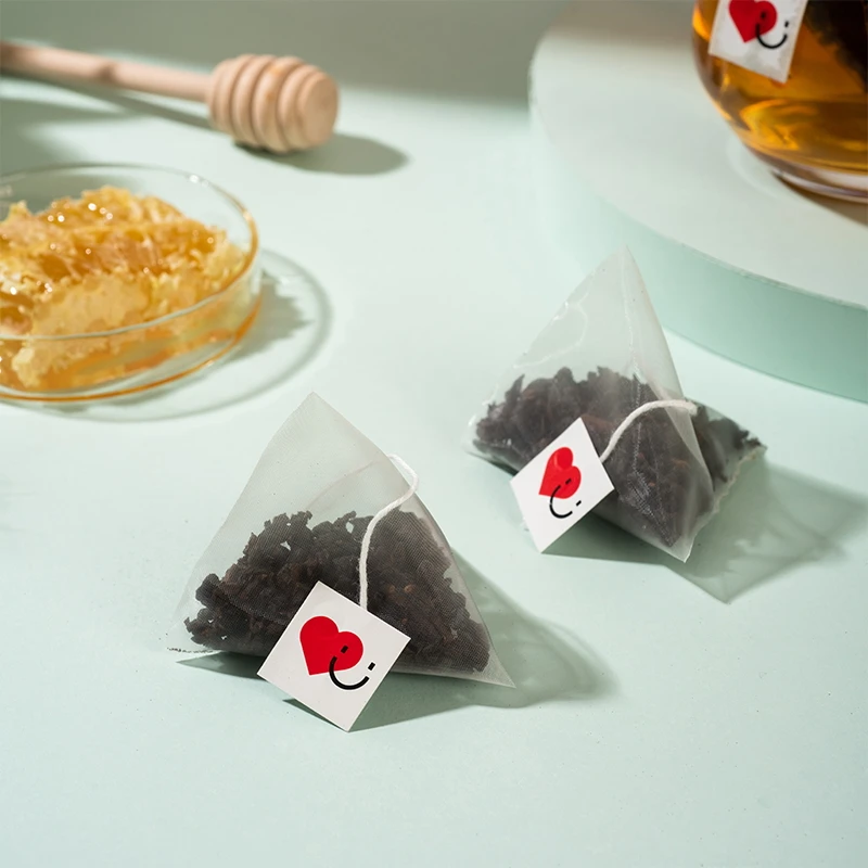 2024 New Flavors private label Biodegradable Pyramid Triangle tea bags Green Tea/black tea/tieguanyin tea