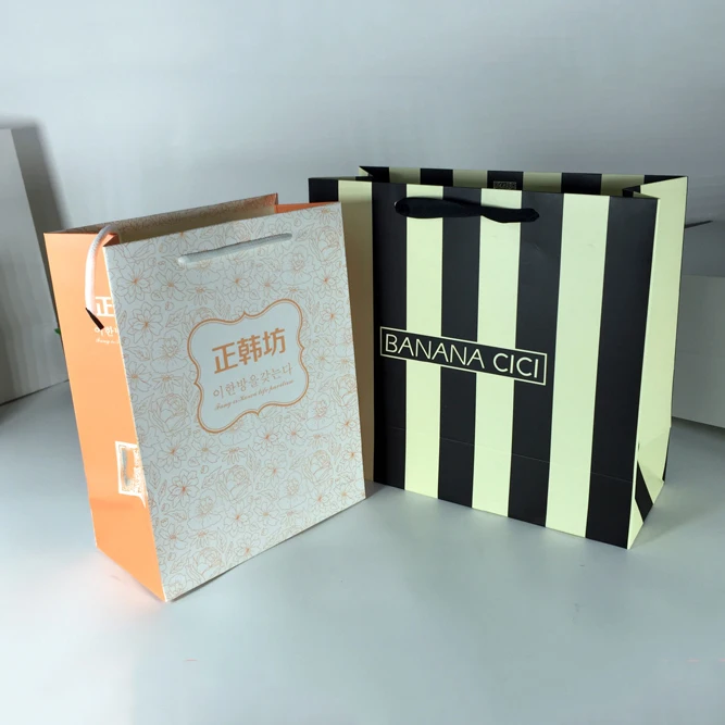 Manufacturer Custom Designed Glossy Lamination Carry Luxury Shopping Paper Packaging Bags With Logo Wholesale