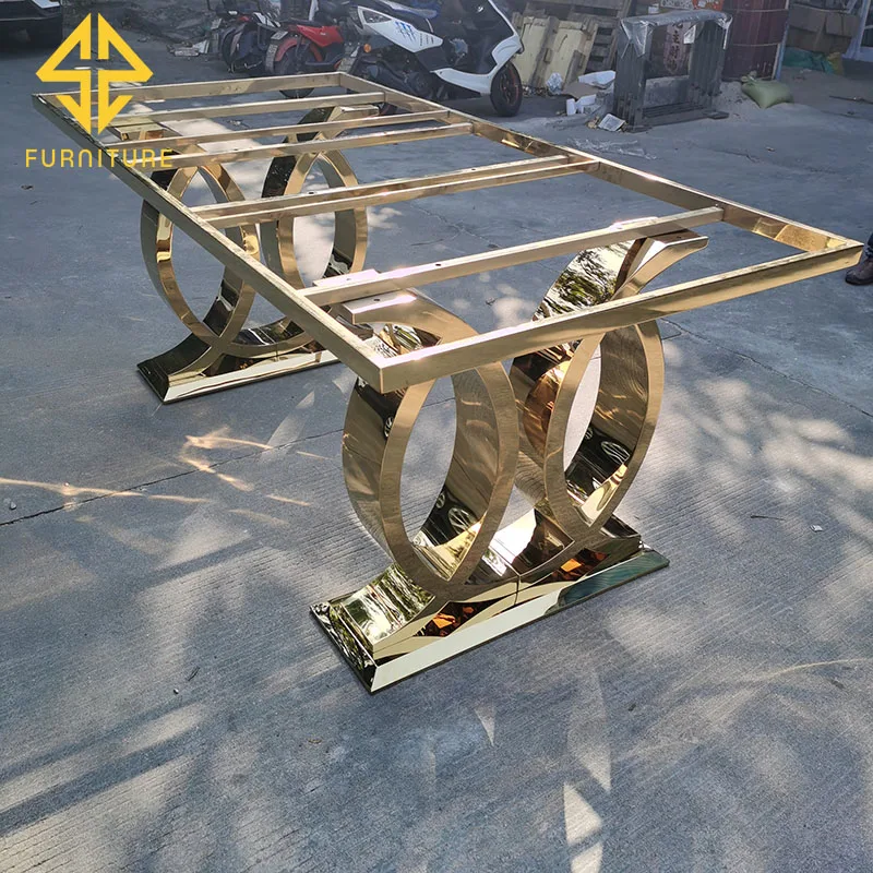 Foshan factory sells new design stainless steel golden dining table at low price, which can be matched with glass table and marb