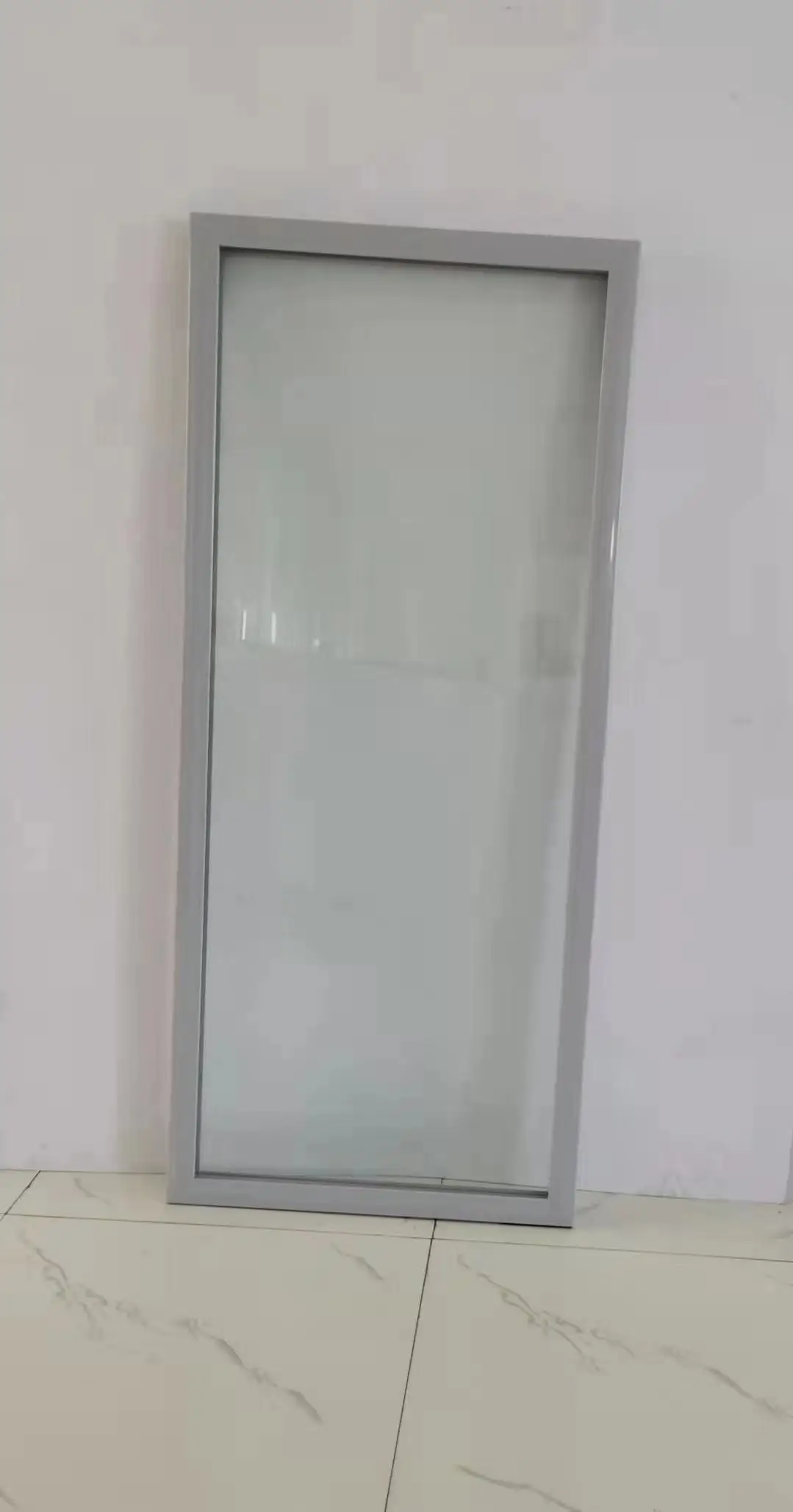 Freezer electric heated laminated glass door