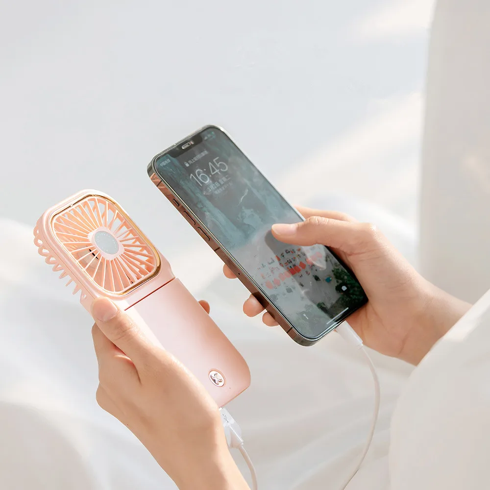 Handheld Mini Portable Folding Fan with Light 3000mAh Power Bank Mobile Phone Fan Custom Plastic Handheld Mobile Fan Outdoor Use