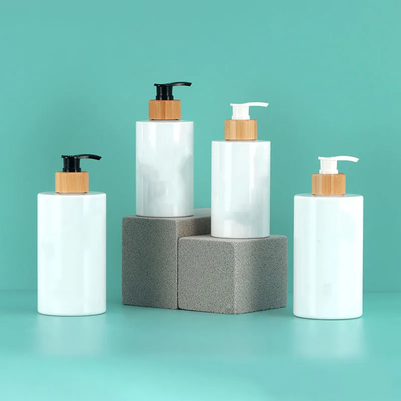 Free Sample Reusable 250ml 300ml Round Shoulder Bamboo Wood Pressed Emulsion Bottle for Cosmetic Packaging Frosted PET Bottle