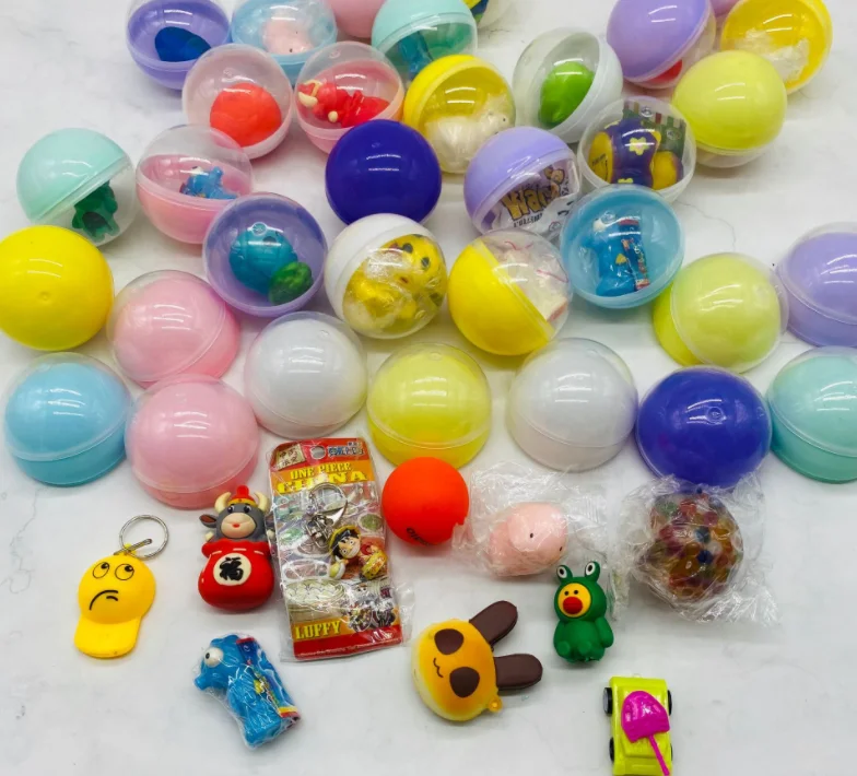 Cheap promotional gift capsule toy 65mm plastic surprise egg capsule ball toy vending machine ball for children