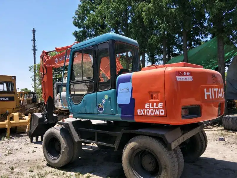 Японский колесный экскаватор HITA CHI EX100WD