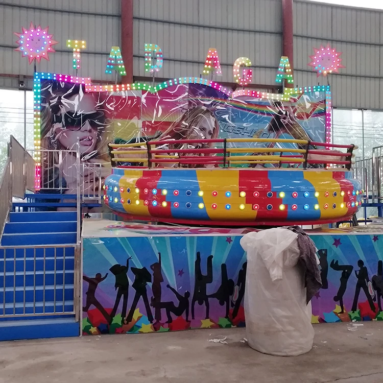 China Hot Sale Exciting Thrill Rides Fairground Amusement Park Game Machine Crazy Turntable Disco Tagada With Trailer