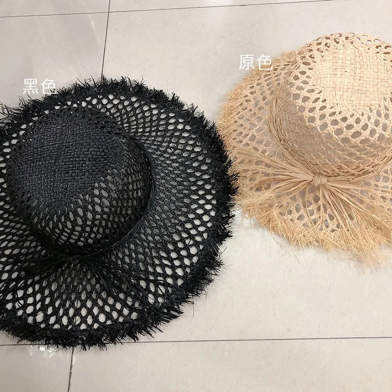 Hot Selling Summer Newest Design Holiday Beach Wide Brim Hollow Out Raffia Black And White Color Straw Hat Bulk for Women