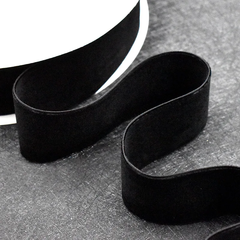 Manufacturers wholesale multi - specification spot white and black elastic velvet ribbon high - quality flocking ribbon