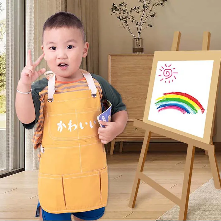 KeFei Apron For Kids Wholesales Comfortable Fabric Material Custom Logo Colorful Draw Work Children Apron With Eyelets