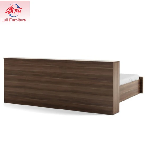 white wooden double bed with drawers