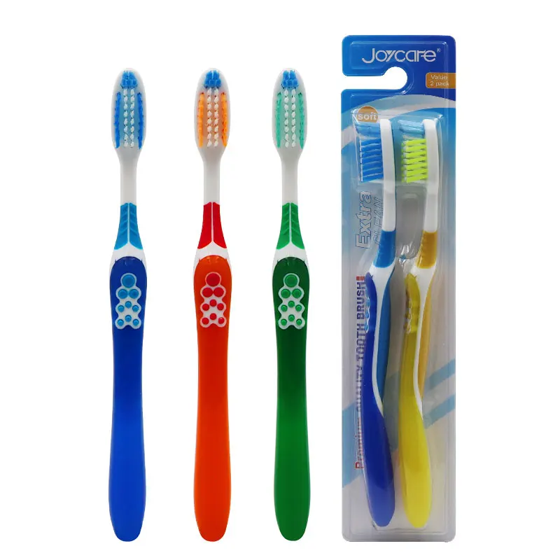 Wholesale custom logo soft cross action bristles gum massage tongue cleaner adult toothbrush