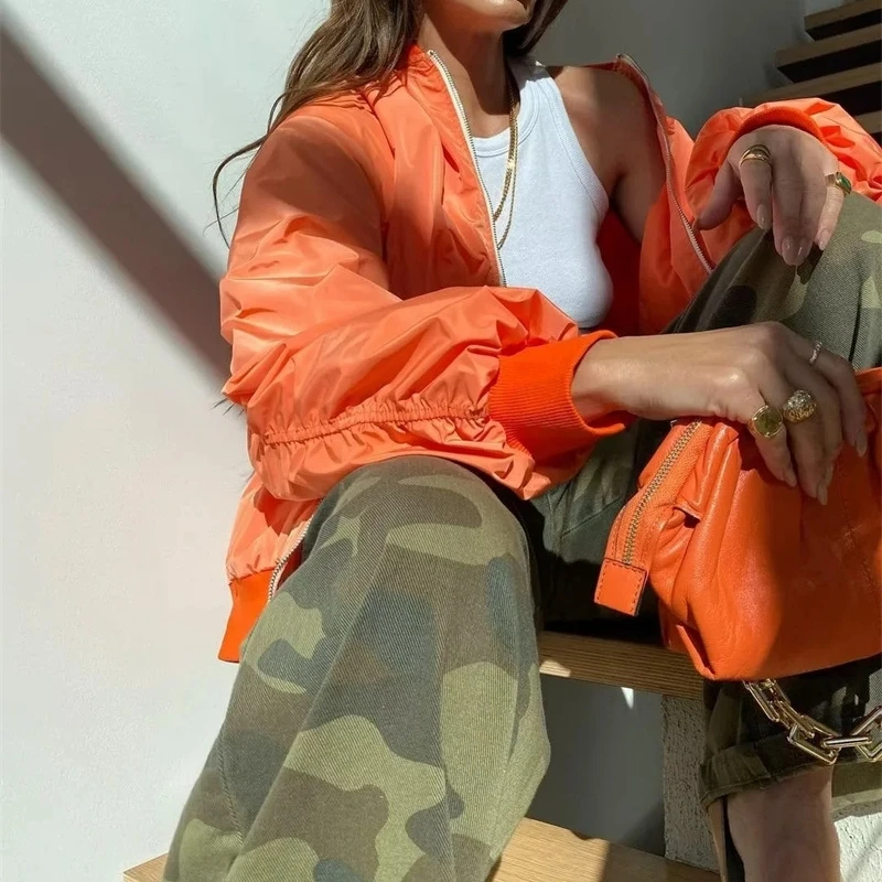 High quality stitching stand collar zipper pleated long sleeve orange crop varsity jacket for women