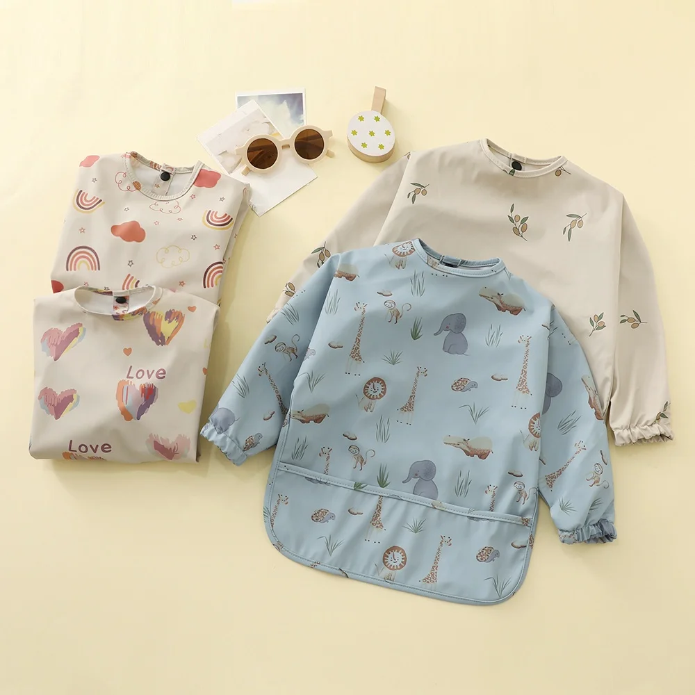 2022 New Arrival Eco Friendly Waterproof Baby Eating Bibs Baby Long Sleeved Feeding Apron Smock Bib With Pocket