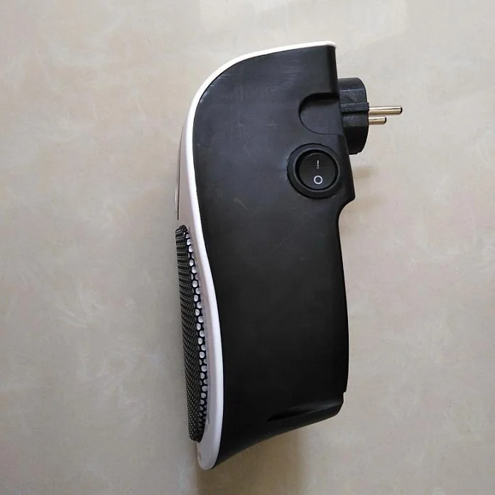 Worldwide Use Mini Portable Wall Outlet Electric Heater for Home