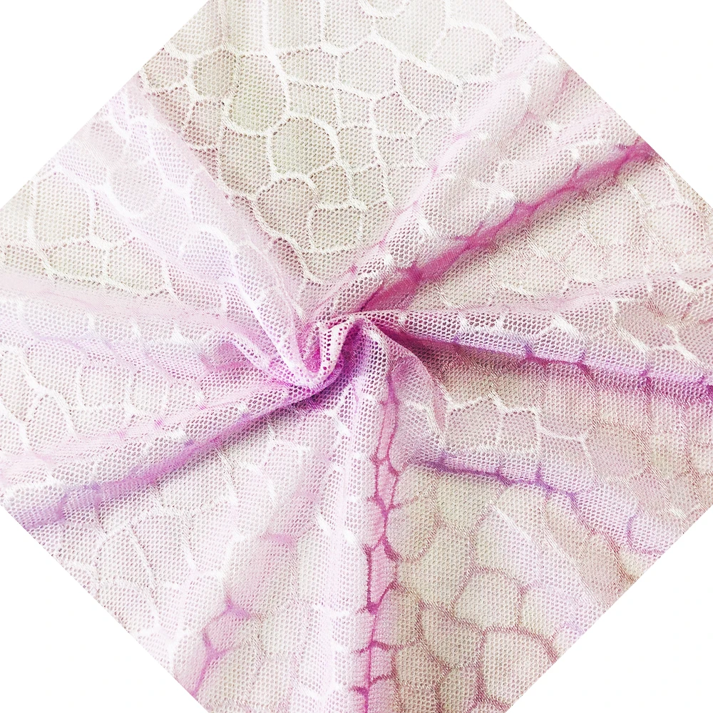 Pink lace fabric in sewing for bridal