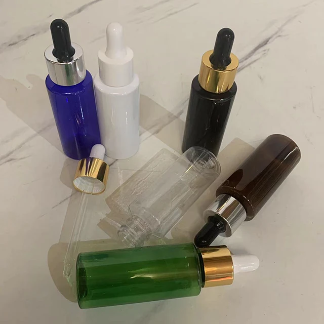 Hengjian Manufacturer Empty 50ml Amber Cosmetic Serum Essential Oil Plastic Dropper Bottle For Massage Oil With Glass Pipette