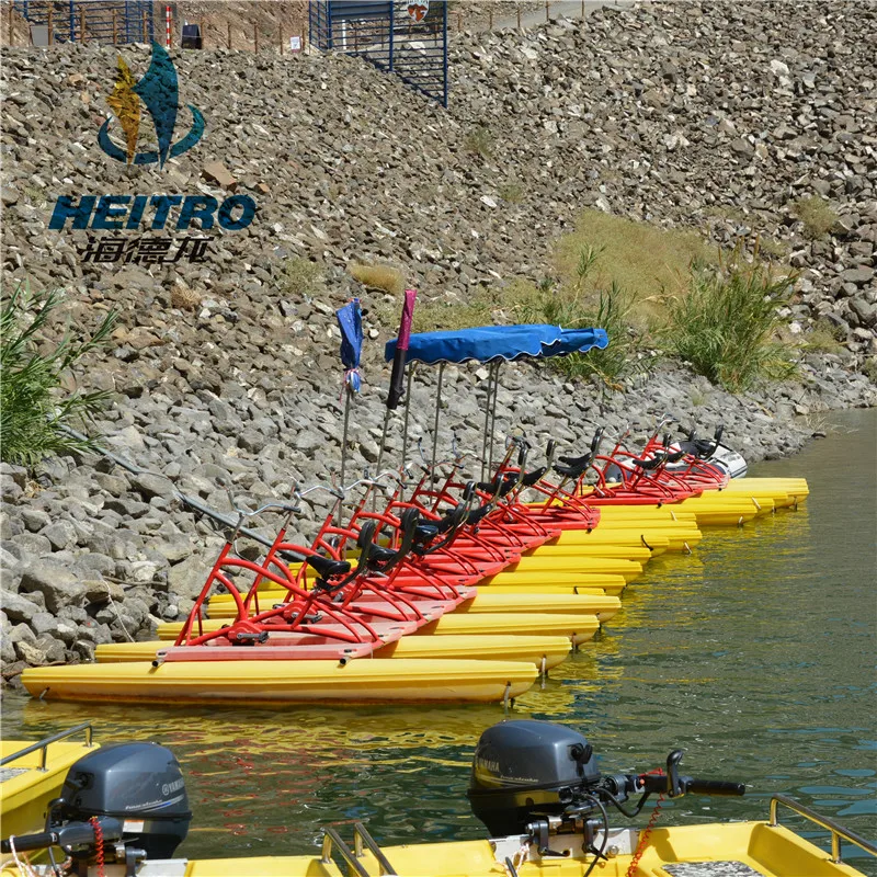 floating boat able to cycle on water mounted on two floats, recreational and competitive activity using water bike