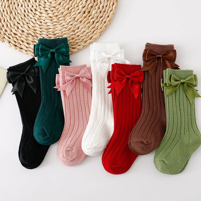 Детские хлопковые носки с бантом и вертикальными полосками