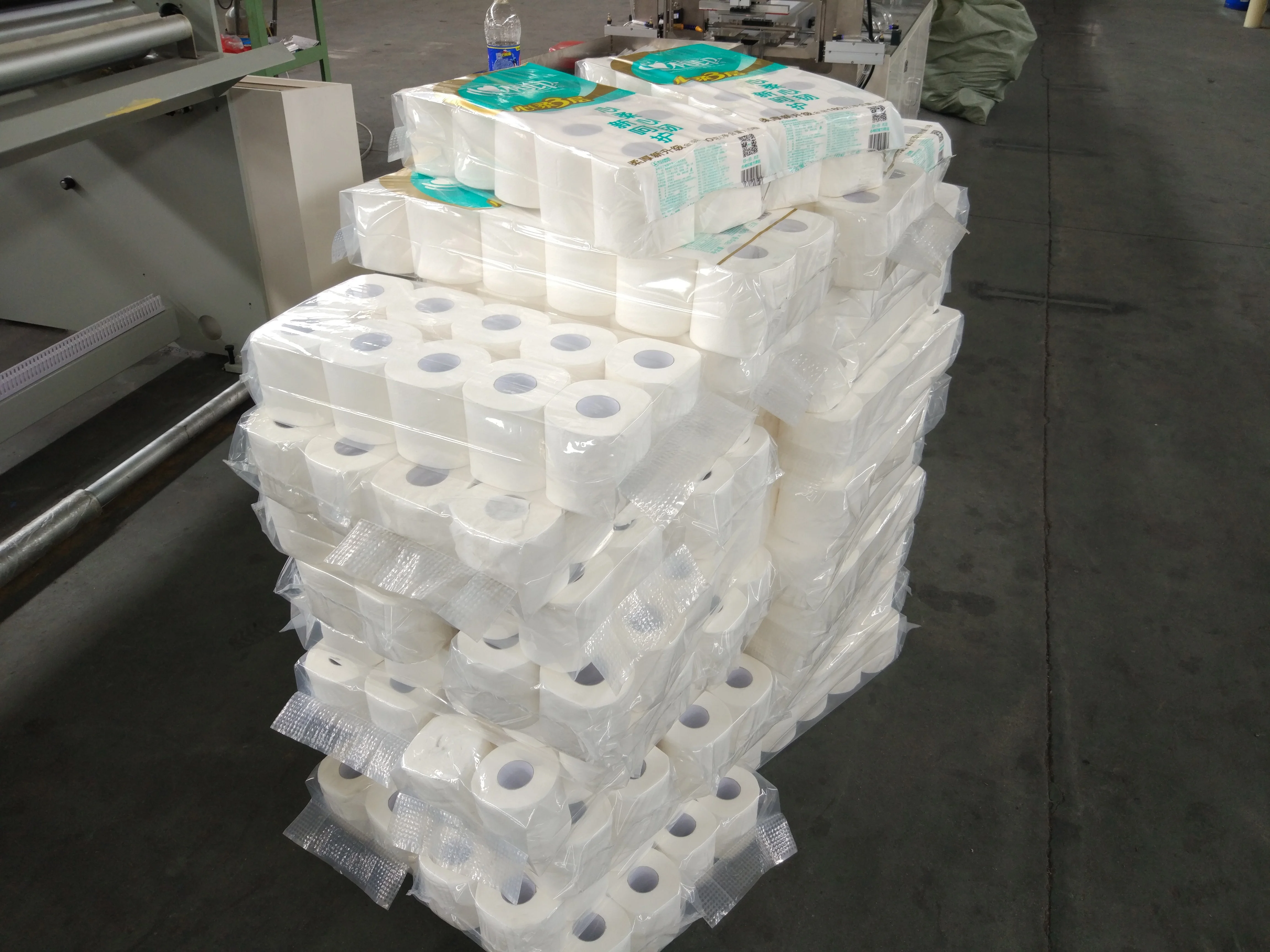 High quality color glue lamination kitchen towel production line color printing double embossing cutting packing machine price