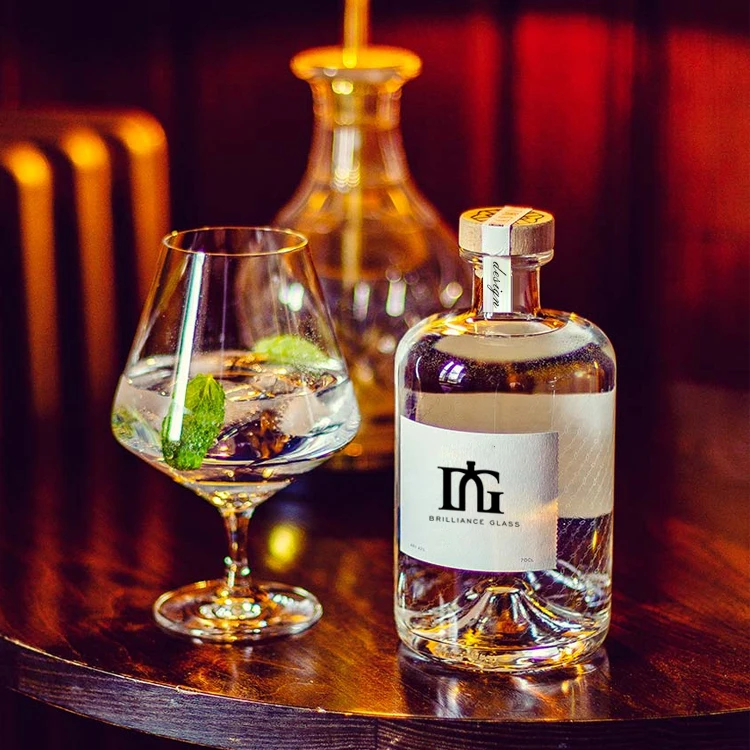 Wholesale 50ml 100ml 375mml 500ml Empty Glass Liquor Bottle Vodka Gin Bottle with Cork Gin Glass Bottle Factory