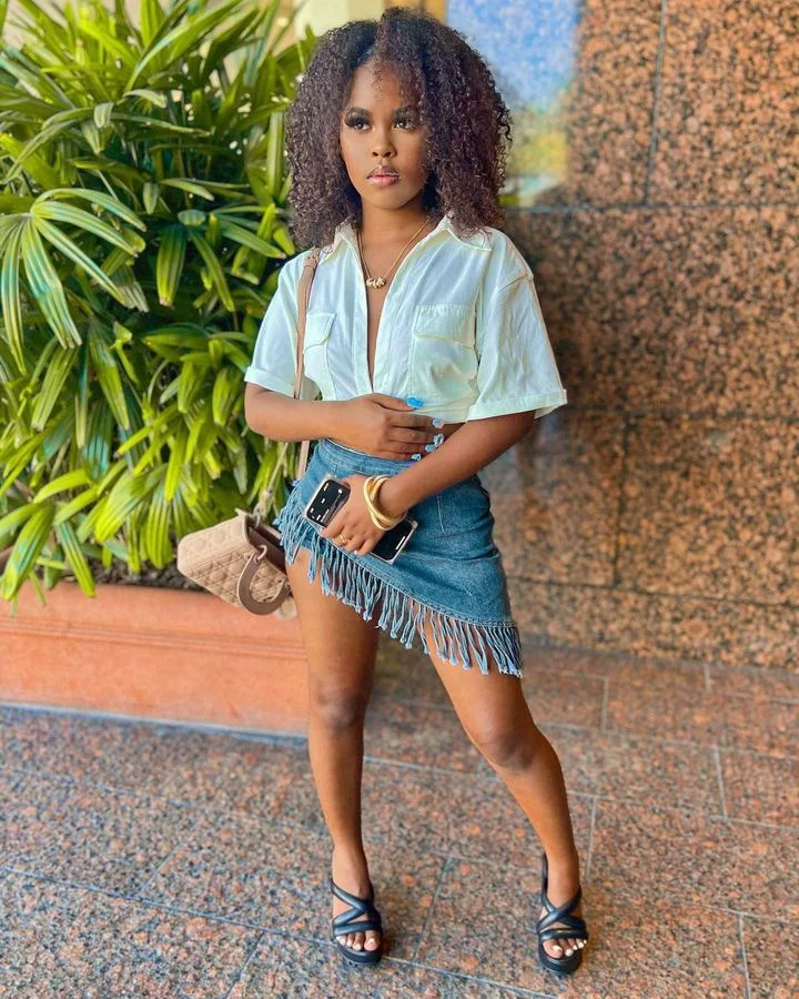 OUDINA Wholesale Streetwear Asymmetrical Mini Skirts 2023 Tassel Sexy Denim Skirt For Women