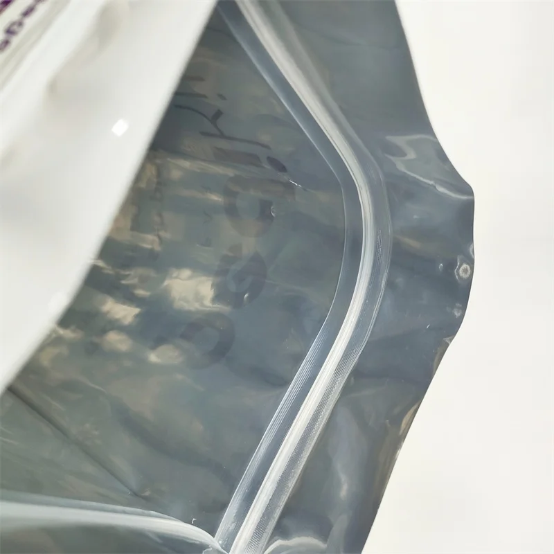 China supplier aluminum foil plastic stand up ziplock packaging bag for 25 pair of hand/foot care socks