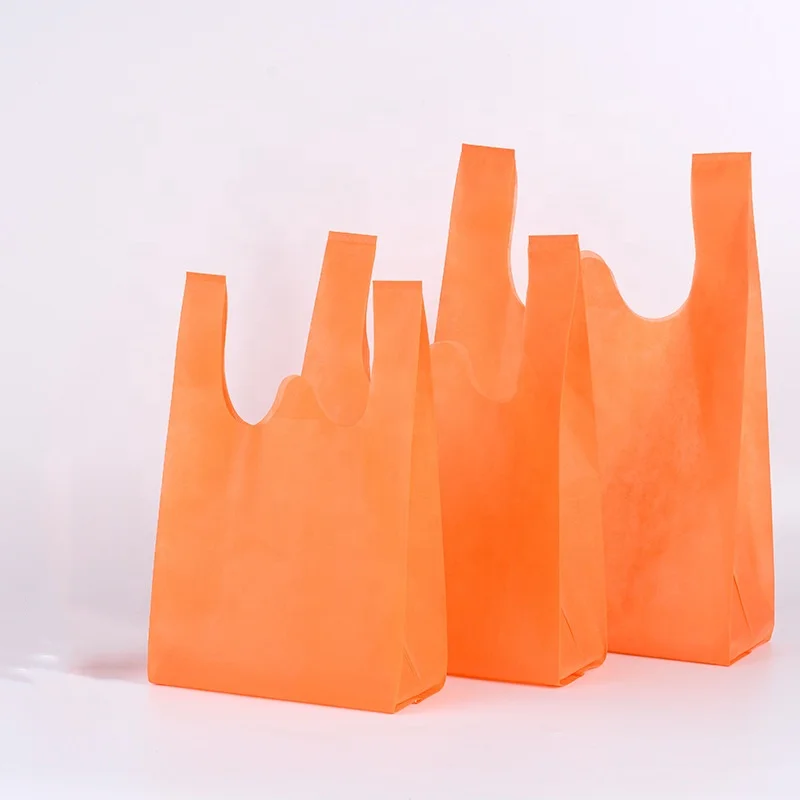 wholesale Cheap reusable non woven retail shopping t-shirt bag eco friendly non woven carrier tote t shirt bags for shopping