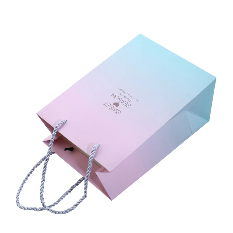 free design hot selling popular style matte black texture white paper shopping bags with pp rope handle