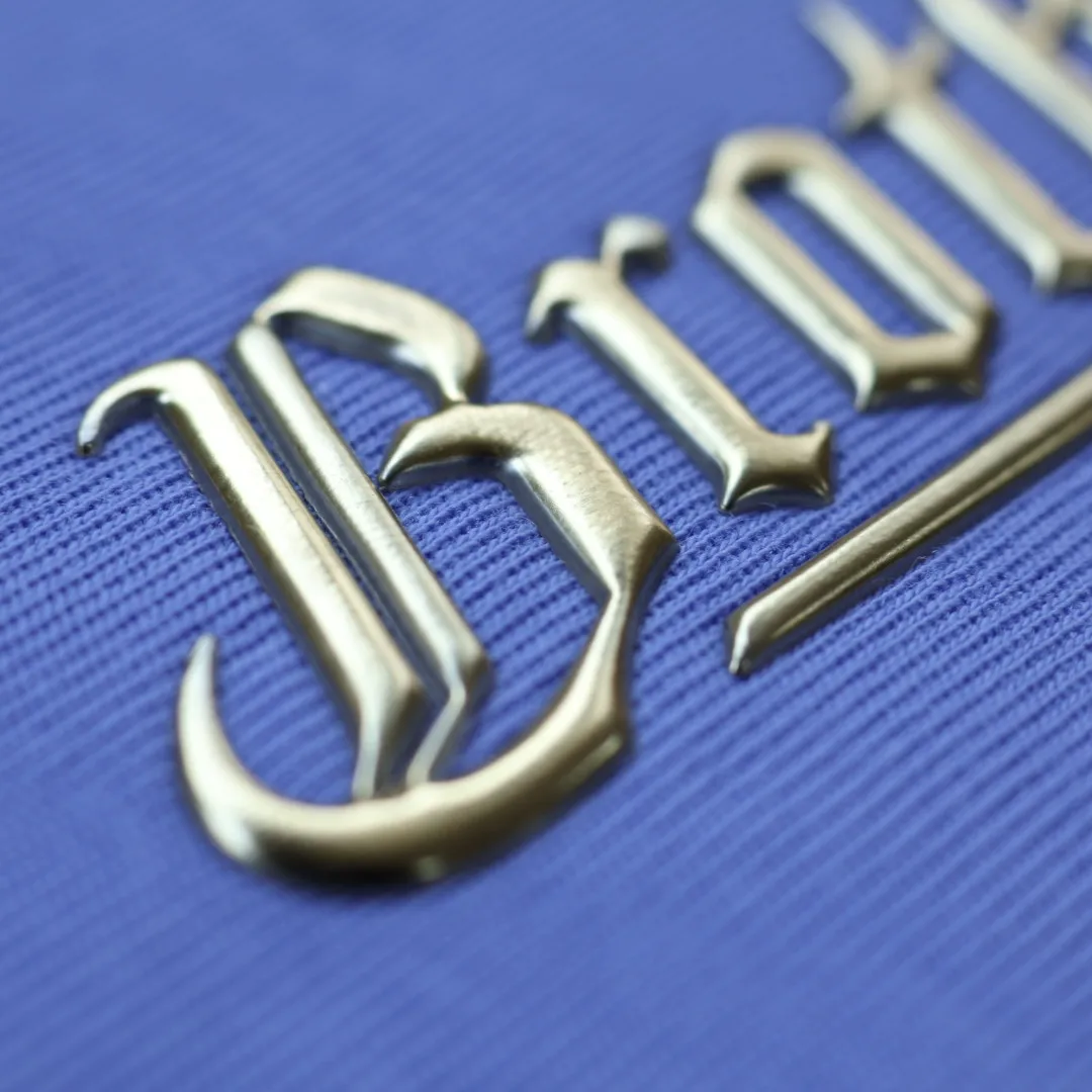 Custom High Quality Golden TPU Heat Transfer Sticker Soft 3D Embossed Patches Badges for Garments