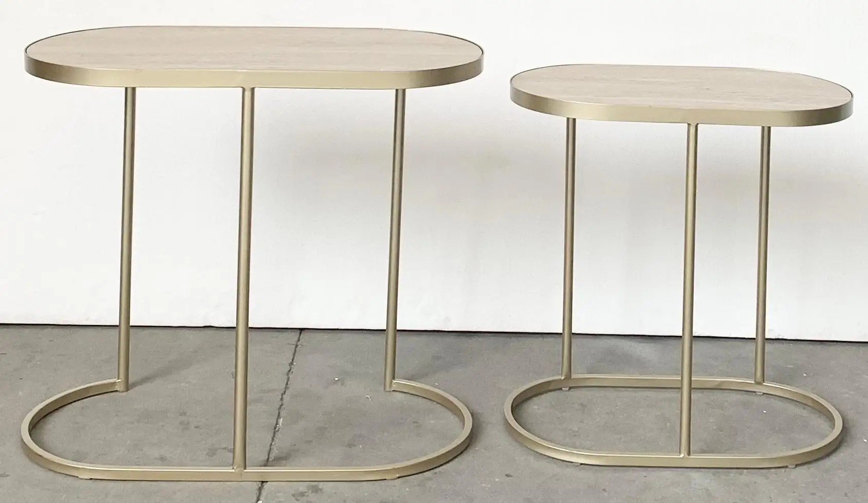 Modern set of 2  pill metal nesting side table with travertine paper top