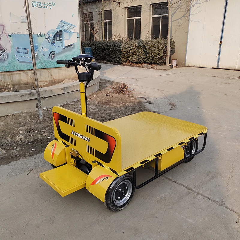 Customized station driving type reverse riding electric flat 4 wheel truck warehouse plant hauler