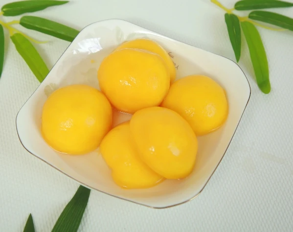 Горячая распродажа свежие консервированные желтые персиковые фрукты в легком сиропе оптом вкусные кости