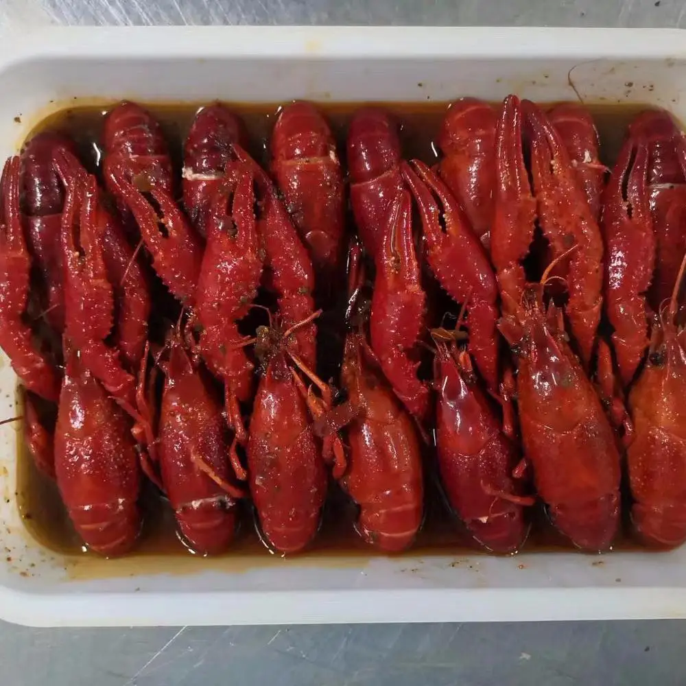 Seasoned cooked frozen hot and spicy crawfish