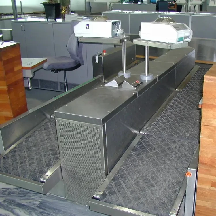 airport air aviation luggage baggage suitcase bag inline belt conveyor ticket tag label labelling check-in counter weigher