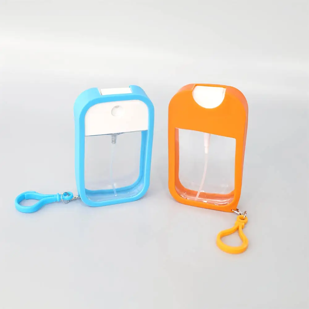 Custom Portable Travel 50ml Refillable Empty Plastic Spray Bottles Card Perfume Atomizer with Silicone Case Keyring