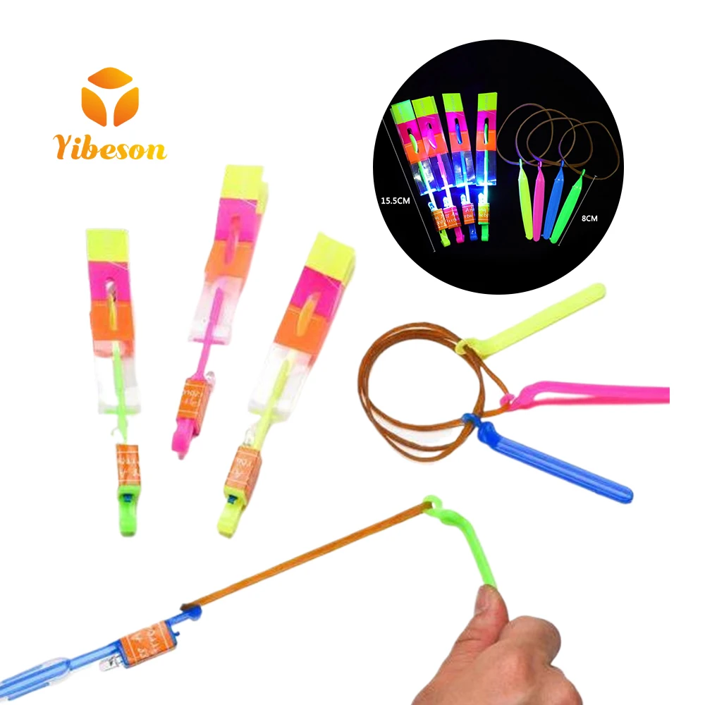 Kids Classic Toy Magic Plastic Light Glowing Rocket Slingshot Shooting Flying Led Arrow Helicopter